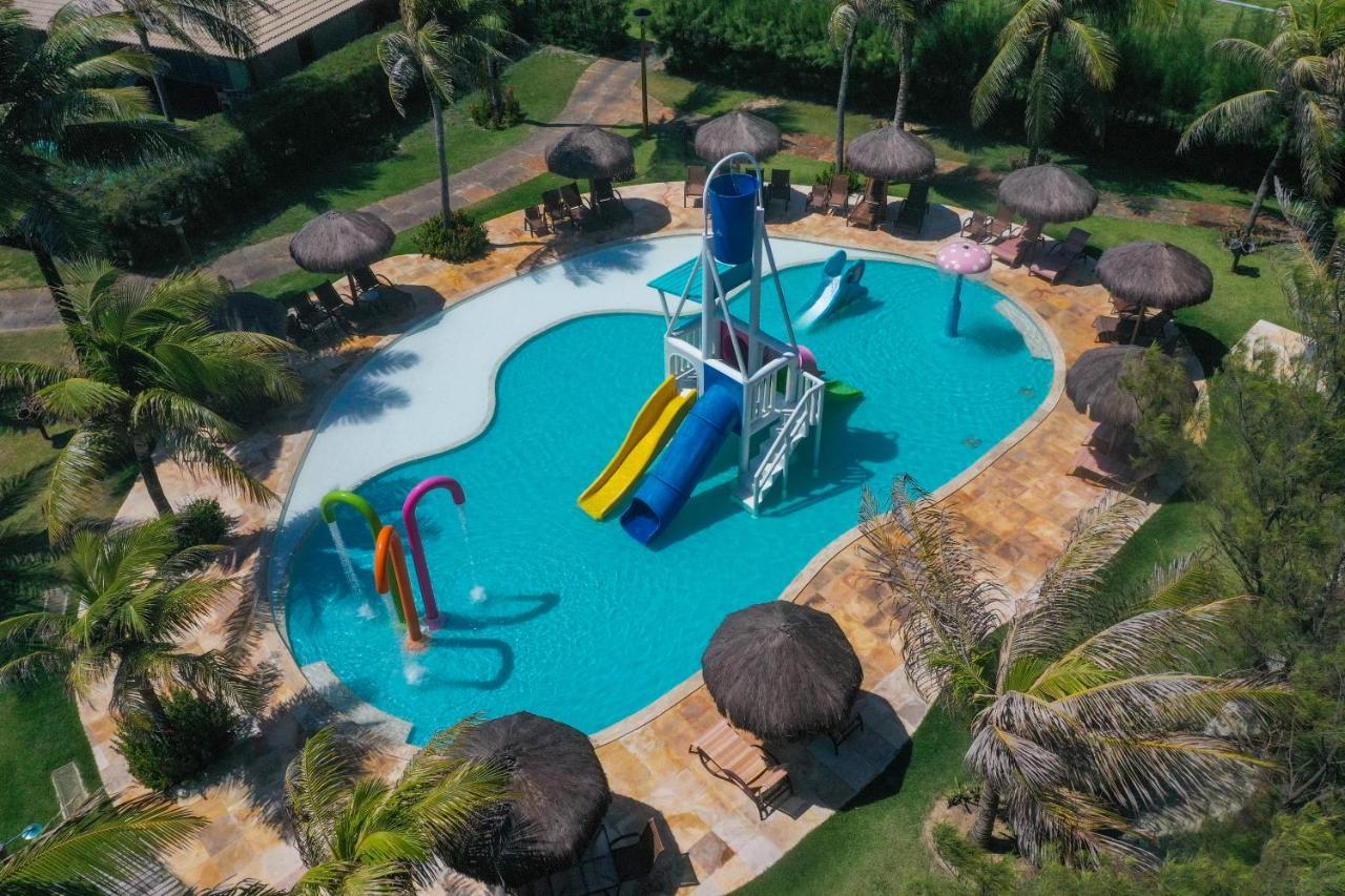 Dom Pedro Laguna Beach Resort & Golf By Wam Experience Aquiraz Dış mekan fotoğraf Aerial view of the resort's swimming pool